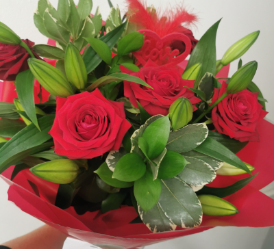 Rose and Lily Love ❤️ Bouquet - A mix of red rose and Lillie's with a mix of foliage and love heart pick, gift wrapped.
If you would like the roses to be pink or white, please state in special instructions