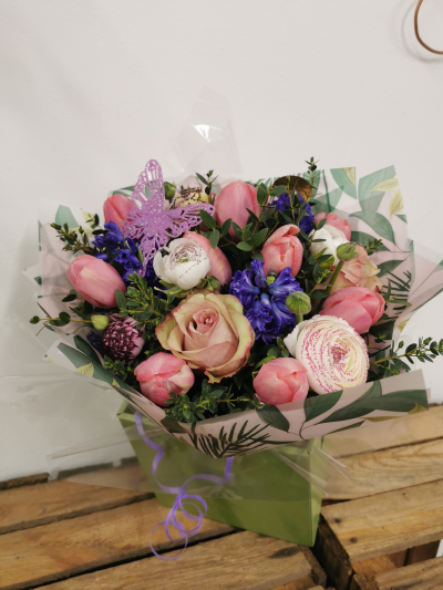 Vintage Spring Aqua box - A selection of spring flowers in pink and purples in an aqua vase or box. Box pictured. Luxury size pictured.